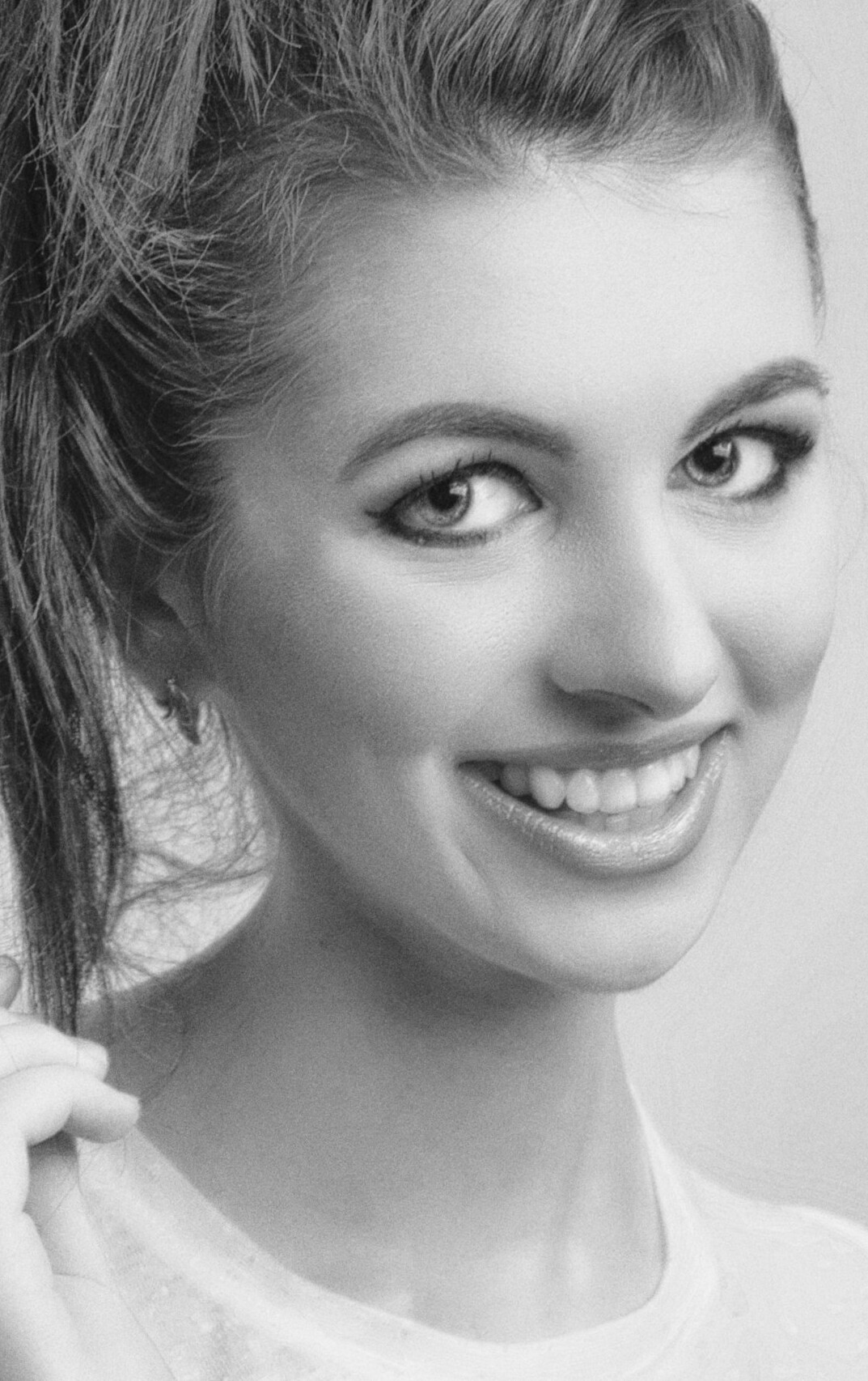 Studio portrait of a young woman smiling