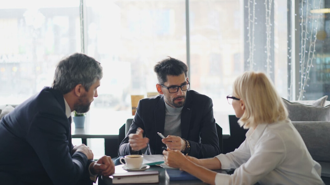 business team discussing software